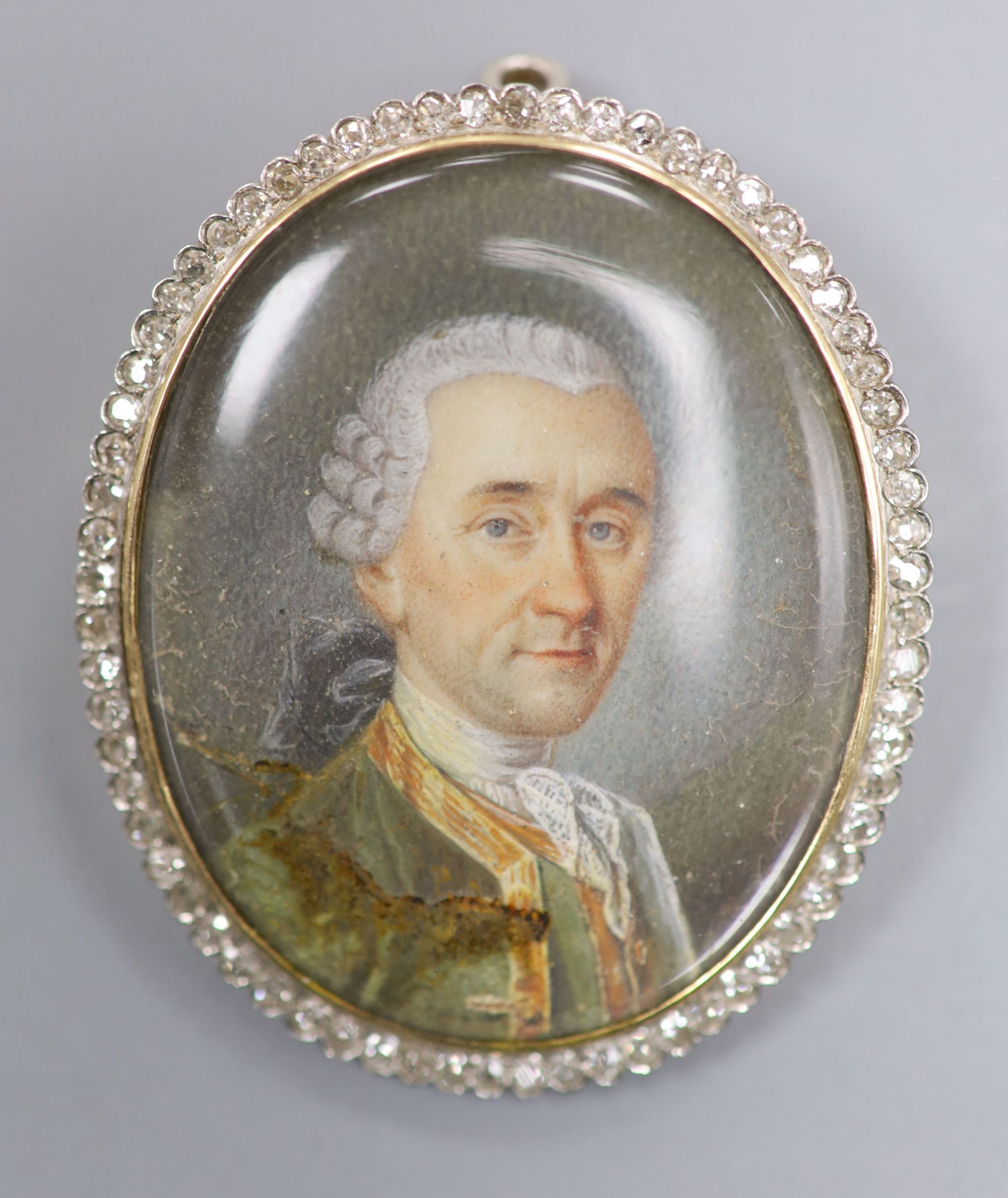 A 19th century miniature on ivory of the bust of a gentleman, in an Austro-Hungarian 580 standard yellow metal frame